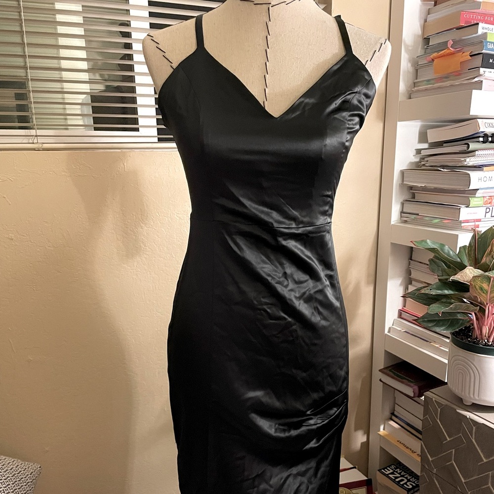 Brand New NEVER worn black midi dress.